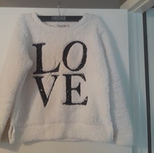 Sherpa LOVE top.  Letters are black sequins